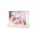 Bebé con ropita en baúl Arias Elegance